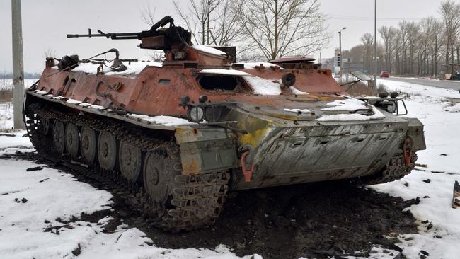 A destroyed Russian military vehicle is seen on the roadside on the outskirts of Kharkiv following the Russian invasion of Ukraine. Picture: AFP