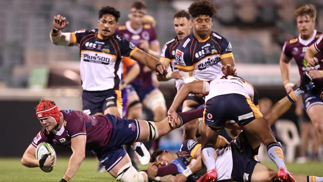 Harry Wilson is tackled by the Brumbies. Picture: Getty Images