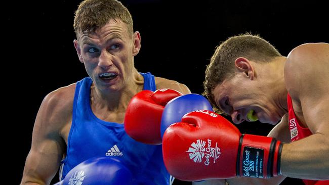 8th April 2018, Oxenford Studios, Gold Coast, Australia; Commonwealth Games day 4; Sean McComb (NIR) blue and Luke McCormick (ENG) red during the Men's Light Welterweight (64kg) Preliminaries (Photo by Roger Evans/Action Plus via Getty Images)