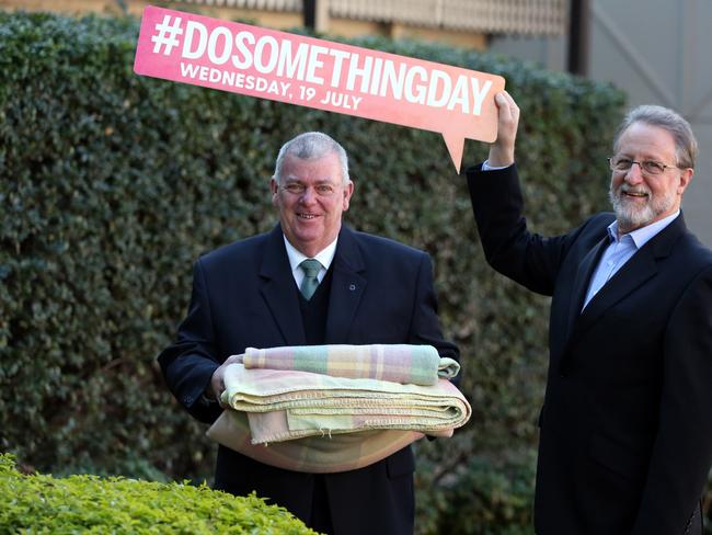 L to R  Guardian Funerals, Location Manager Greg Baxter and Executive Officer, St Vincent De Paul Society Graeme Roche . Bankstown, Tuesday, July, 18, 2017. Guardian Funerals Bankstown employee Greg Baxter will hand over more than 100 blankets they have collected from the public to a representative of St Vincent de Paul's. Vinnie's give them to homeless. (AAP Image/Angelo Velardo)