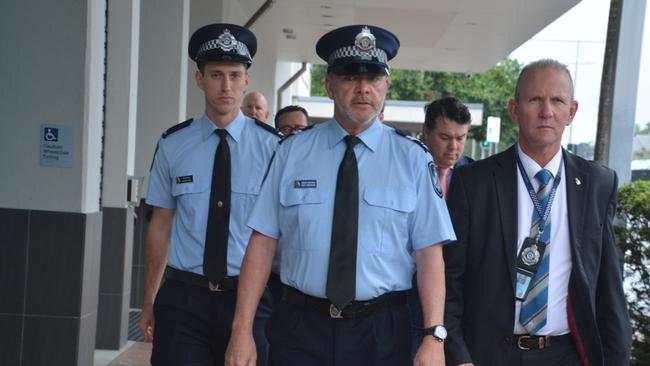 Queensland Police entering Cairns Court House for the inquest into the police shooting death of Luke Gilbert, 24, at Airlie Beach on October 1, 2022. Picture: Bronwyn Farr