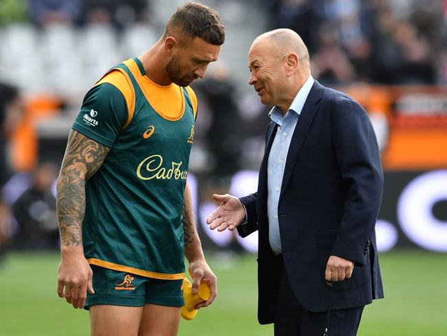 Quade Cooper (L) was turfed just before the World Cup by coach Eddie Jones (R). Picture: AFP