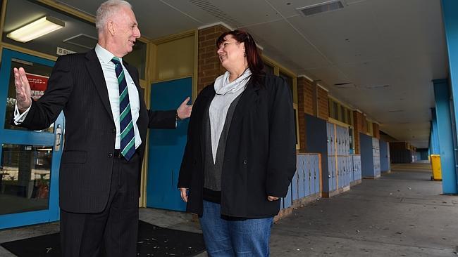 Education Minister Martin Dixon inspects Cranbourne Secondary College with school president Elvira Ritzert. Picture: Jason Sammon