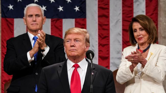 US President Donald Trump delivers the State of the Union address, alongside Vice President Mike Pence and Speaker of the House Nancy Pelosi.