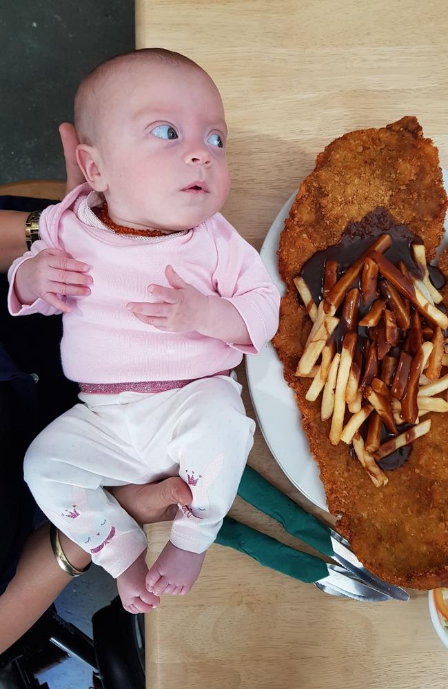 Sarah Atkins shared this photo of her baby daughter Jorja, alongside the epic crumbed steak at the Pinnacle Pub.