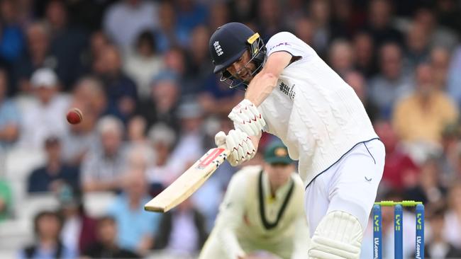 Woakes hits a boundary just before tea. (Photo by Stu Forster/Getty Images)