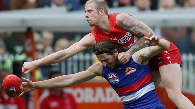 Zak Jones gives away a free kick to Marcus Bontempelli. Picture: Michael Klein