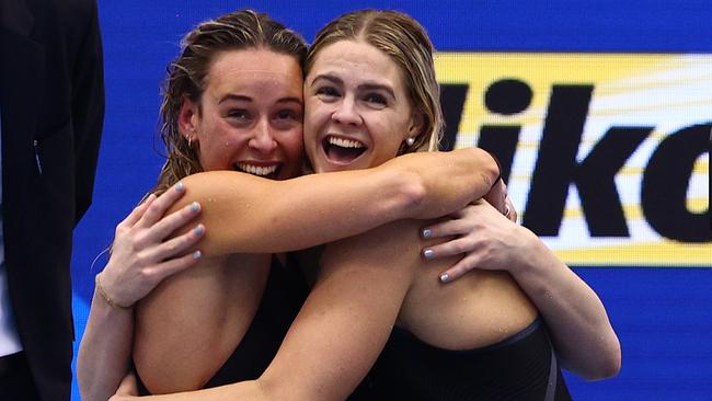 Brianna Throssell and Shayna Jack celebrate winning gold in a new world record time. Picture: Clive Rose/Getty Images