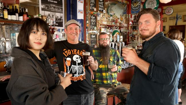 TCrown and Anchor proprietor Tom Skipper with Cranker supporter group members, Liberty Li, Dan Bogan Kirk, and Evan Morony. Picture: Dean Martin