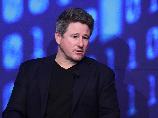 Chief Executive Officer of Stan and Nine Entertainment Mike Sneesby (left) is seen onstage during a panel discussion at the Morgan Stanley Australian Summit 2019 in Sydney, Tuesday, June 4, 2019. (AAP Image/Bianca De Marchi) NO ARCHIVING