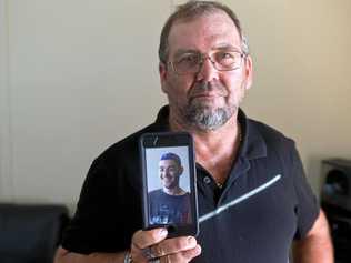 Andrew Gordon with a photo of his son David who died after a motorcycle accident at Bucasia Beach on Sunday night. Picture: Emma Murray