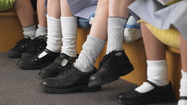 The primary school teacher admitted to taking the socks and shoes off her deaf student, but said it was for safety reasons.