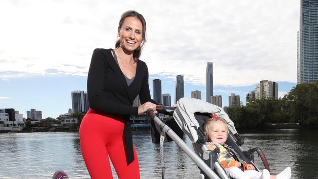 Amanda Abate will be doing the Gold Coast Marathon 5km event pushing daughter Pia 10months in a pram. Amanda and Pia out training.  Picture Glenn Hampson