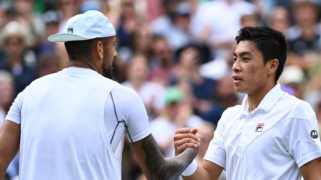 Nick Kyrgios (left) and Brandon Nakashima shake hands at the end of their match. Picture: AFP