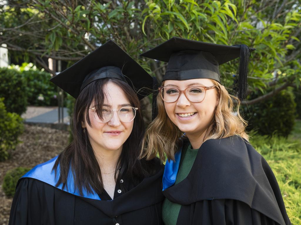 Bachelor of Nursing graduates Penny Warner (left) and Jorja Wiedman at a UniSQ graduation ceremony at Empire Theatres, Tuesday, October 31, 2023. Picture: Kevin Farmer