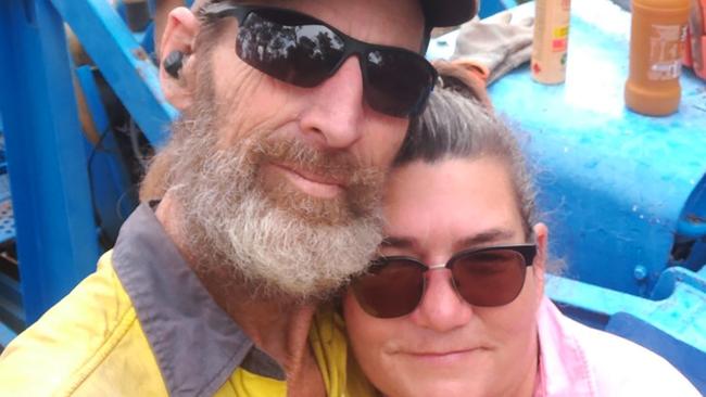 Kerry Dare, with her husband Alan, had contacted triple-0 about the fires.