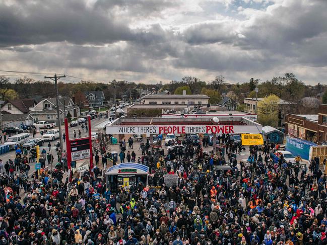 People gather at the intersection of 38th Street and Chicago Ave in Minneapolis, near to the spot where George Floyd died, to celebrate the verdict. Picture: Getty Images/AFP