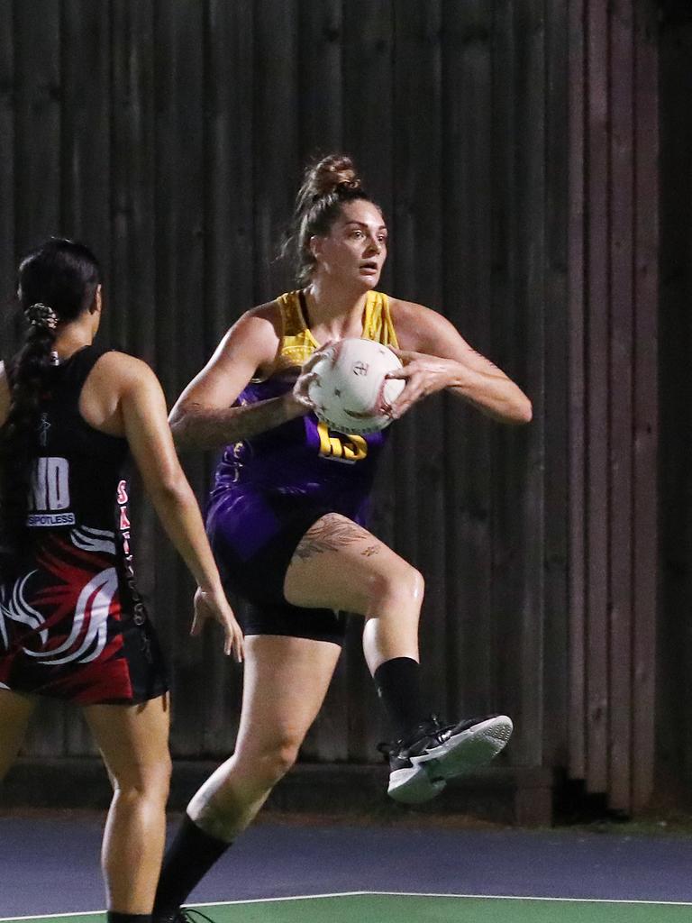 Fierce's Cayla George looks to pass in the Cairns Netball Association Senior Division 1 match between the Phoenix Fierce and the Cairns Saints. PICTURE: BRENDAN RADKE