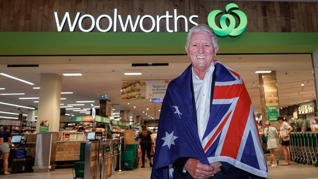 Retail outlet owner Chris Garnaut promotes Australia Day. Picture: Nadir Kinani