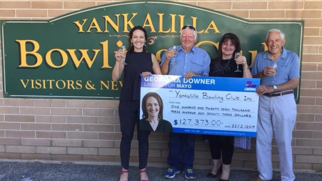 Former Liberal candidate for Mayo Georgina Downer gives a novelty cheque to Yankalilla Bowling Club last February. Picture: Georgina Downer / Facebook