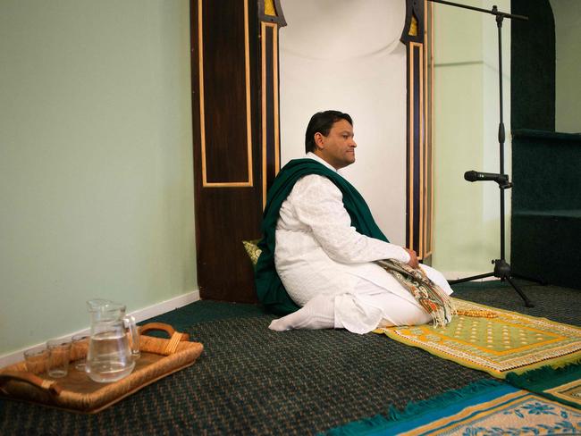 (FILES) Imam Muhsin Hendricks leads the start of the Jumu'ah prayer at the Inner Circle Mosque, in Wynberg, on September 2, 2016, in Cape Town. Muhsin Hendricks, considered the world's first openly gay imam, was shot dead on February 15, 2025 near the southern city of Gqeberha, South African police said. The imam, who ran a mosque intended as a safe haven for gay and other marginalised Muslims, was in a car with another person when a vehicle stopped in front of them and blocked their exit, police said. (Photo by RODGER BOSCH / AFP)