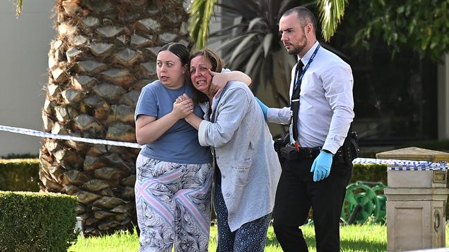 Distraught family members at the scene in the hours after his death. Picture AAP Image/James Ross