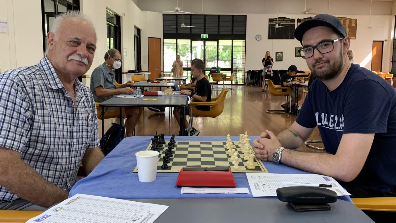 Tony Weller (left) and Liam Healey battle it out at the Mackay Chess Open on May 14. Picture: Duncan Evans