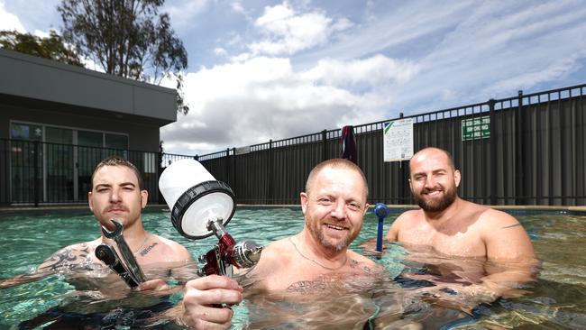 HHarvey Prestige employees Benjamin Bentley, Richard Kirby and Rodrigo Silveira cool down. Photograph: Jason O'Brien