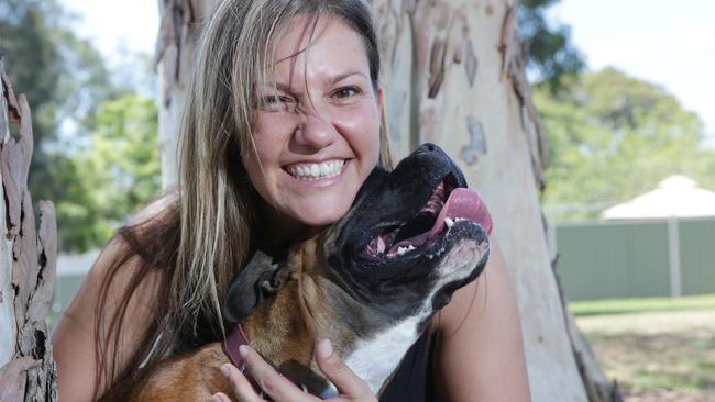 Ana Phillips with her lucky Boxer Marley. Picture: Tim Clapin