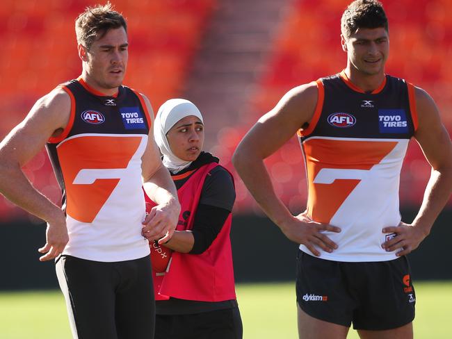 Kassem mixing it with big boys Jeremy Cameron and Jon Patton at GWS training. Picture: Phil Hillyard