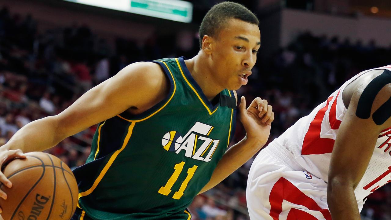 HOUSTON, TX - APRIL 15: James Harden #13 of the Houston Rockets defends against Dante Exum #11 of the Utah Jazz during their game at the Toyota Center on April 15, 2015 in Houston, Texas. NOTE TO USER: User expressly acknowledges and agrees that, by downloading and/or using this photograph, user is consenting to the terms and conditions of the Getty Images License Agreement. (Photo by Scott Halleran/Getty Images)