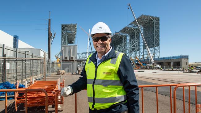 Australian Naval Infrastructure chief executive David Knox in front of the ship erection hall under construction at the Osborne Shipyard. Picture: Brad Fleet