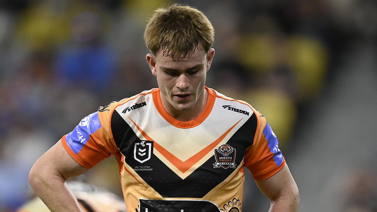 TOWNSVILLE, AUSTRALIA - MAY 24: Lachlan Galvin of the Tigers looks dejected after a Cowboys try during the round 12 NRL match between North Queensland Cowboys and Wests Tigers at Qld Country Bank Stadium, on May 24, 2024, in Townsville, Australia. (Photo by Ian Hitchcock/Getty Images)