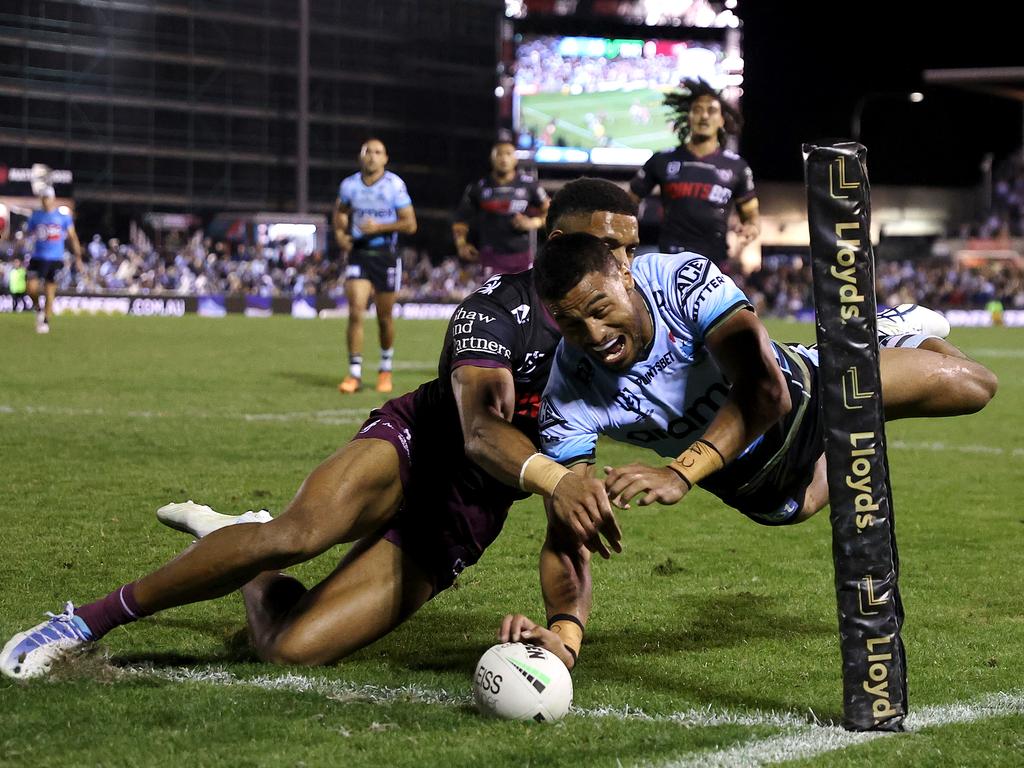 NRL SEA EAGLES ROOSTERS, Tolutau Koula of the Sea Eagles celebrates a try  with team mates