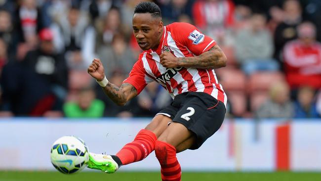 xxxx of Southampton is tackled by xxxx of Burnley during the Barclays Premier League match between Southampton and Burnley at St Mary's Stadium on March 21, 2015 in Southampton, England.