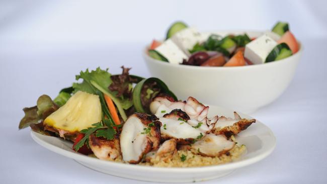 Chargrilled octopus with a Greek salad at Estia Restaurant.