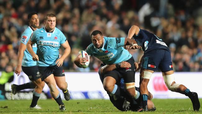 Sekope Kepu of the Waratahs is tackled during the Round 12 Super Rugby match between the NSW Waratahs and the Blues at Brookvale Oval in Sydney on Saturday, May 5, 2018. (AAP Image/Jeremy Ng) NO ARCHIVING, EDITORIAL USE ONLY (Photo by JEREMY NG/AAPIMAGE)