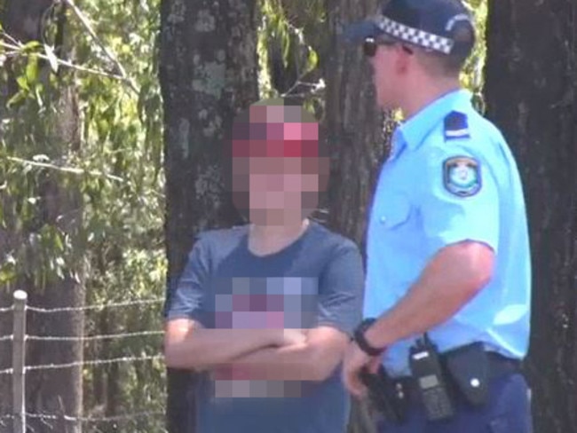 Police speak with a 12 year old boy who was witness to the shooting / Picture: Top Notch Video