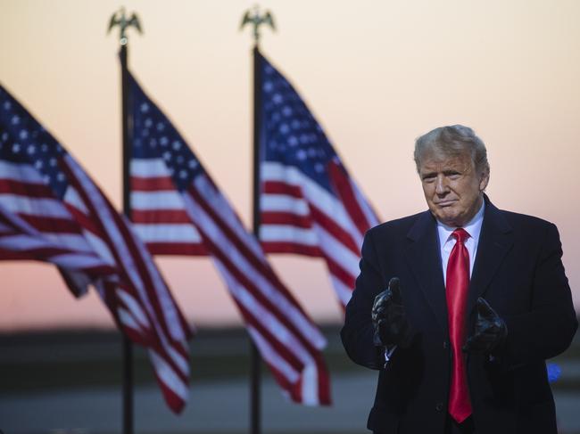 President Donald Trump speaks at a socially distanced rally at Rochester International Airport in Rochester, Minnesota. Picture: Angus Mordant