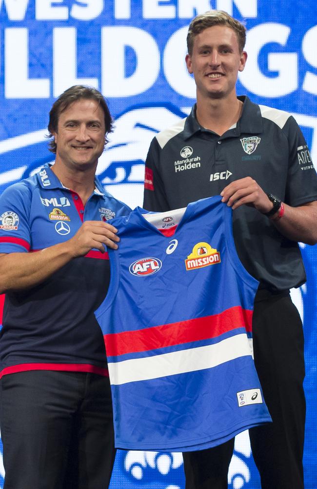 Naughton and Luke Beveridge possess a strong bond. Picture: AAP Image/Craig Golding