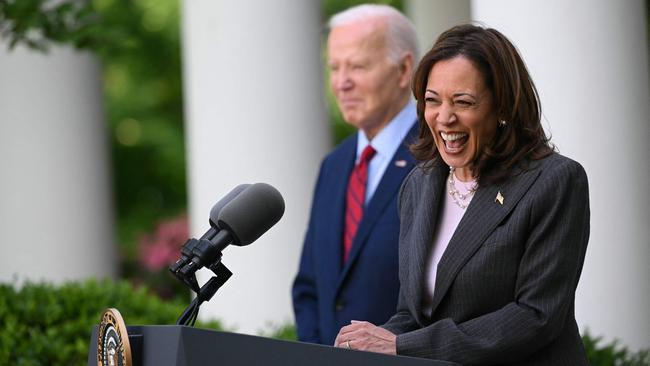 US President Joe Biden listens as Vice President Kamala Harris delivers remarks at a reception in the Rose Garden of the White House in May. Picture: AFP