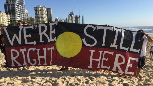 Protesters are pictured on Kurrawa Beach as they disrupt the Commonwealth Games broadcast of Sunrise. Picture: Twitter