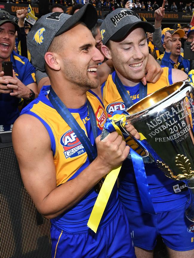 Dom Sheed (left) and Jeremy McGovern with the 2018 premiership cup. Picture: AAP Image/Julian Smith