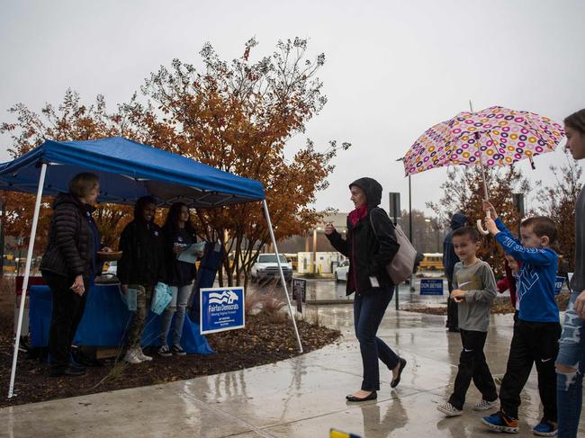 Rain has lashed the eastern seaboard of the US, which could affect voter turnout. Picture: AFP