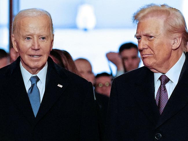 US President Joe Biden (L) and President-elect Donald Trump arrive for the inauguration ceremony where Donald Trump will sworn in as the 47th US President in the US Capitol Rotunda in Washington, DC, on January 20, 2025. (Photo by Melina MARA / POOL / AFP)