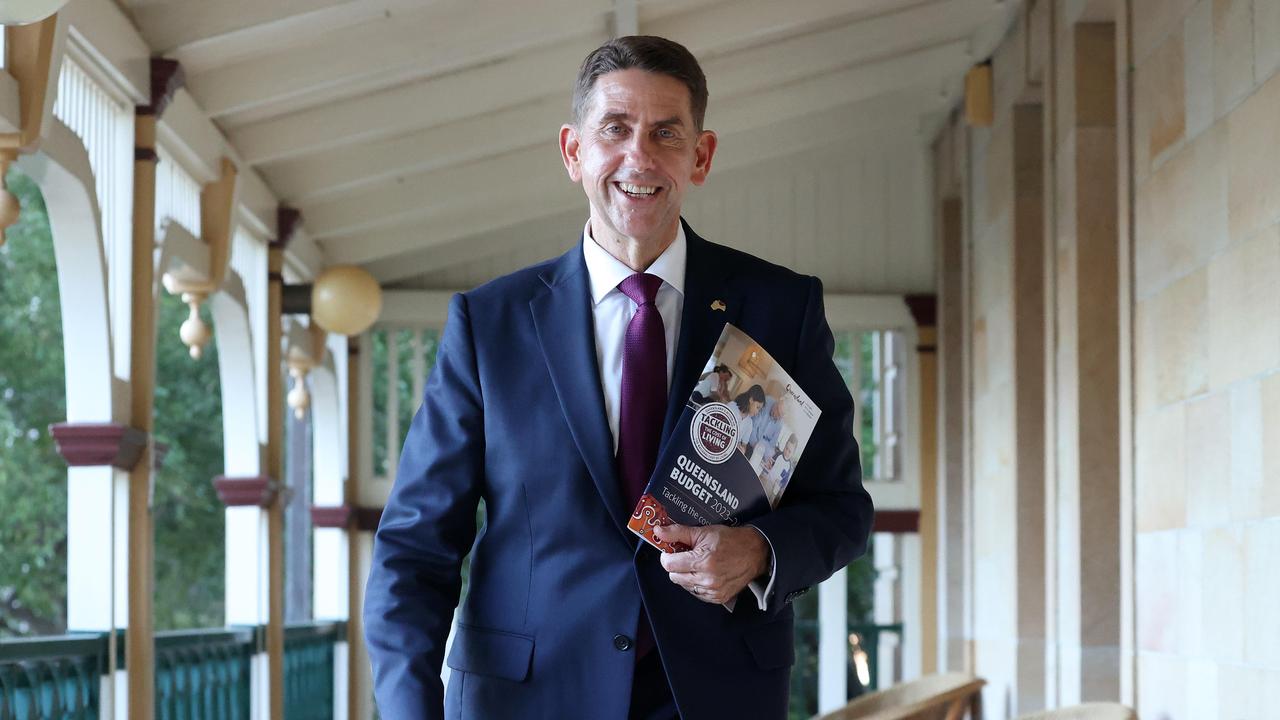 Treasurer Cameron Dick with his budget in Parliament House in Brisbane on Tuesday. Picture: Liam Kidston