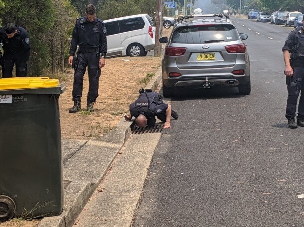 Police search drains for clues.