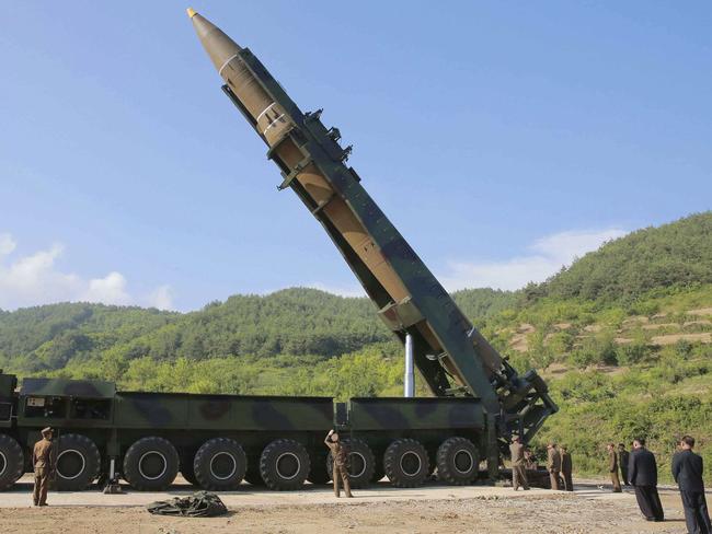 Kim Jong-un, second from right, inspects the preparation of the launch of a Hwasong-14 intercontinental ballistic missile on July 4. Picture: Korean Central News Agency/Korea News Service/AP