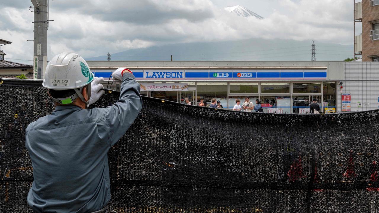 The barrier was removed a few months later having reportedly done its job. Picture: Kazuhiro Nogi / AFP