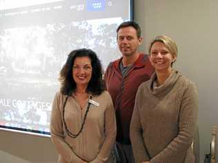 DIGITAL WORLD: Liz Ward, of Tourism Tribe, with Stephen and Taya Michalski, owners of Diamondvale Cottages. Picture: DEIRDRE SMITH